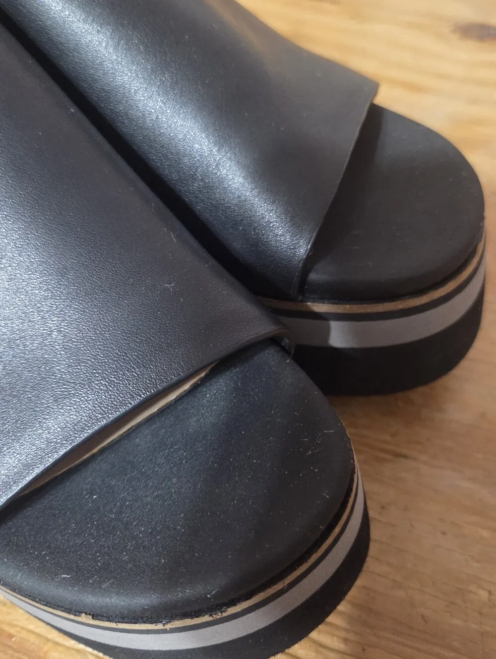 Naked Feet Shoes featuring a multi-tone gray and black stacked wedge Womens 9
